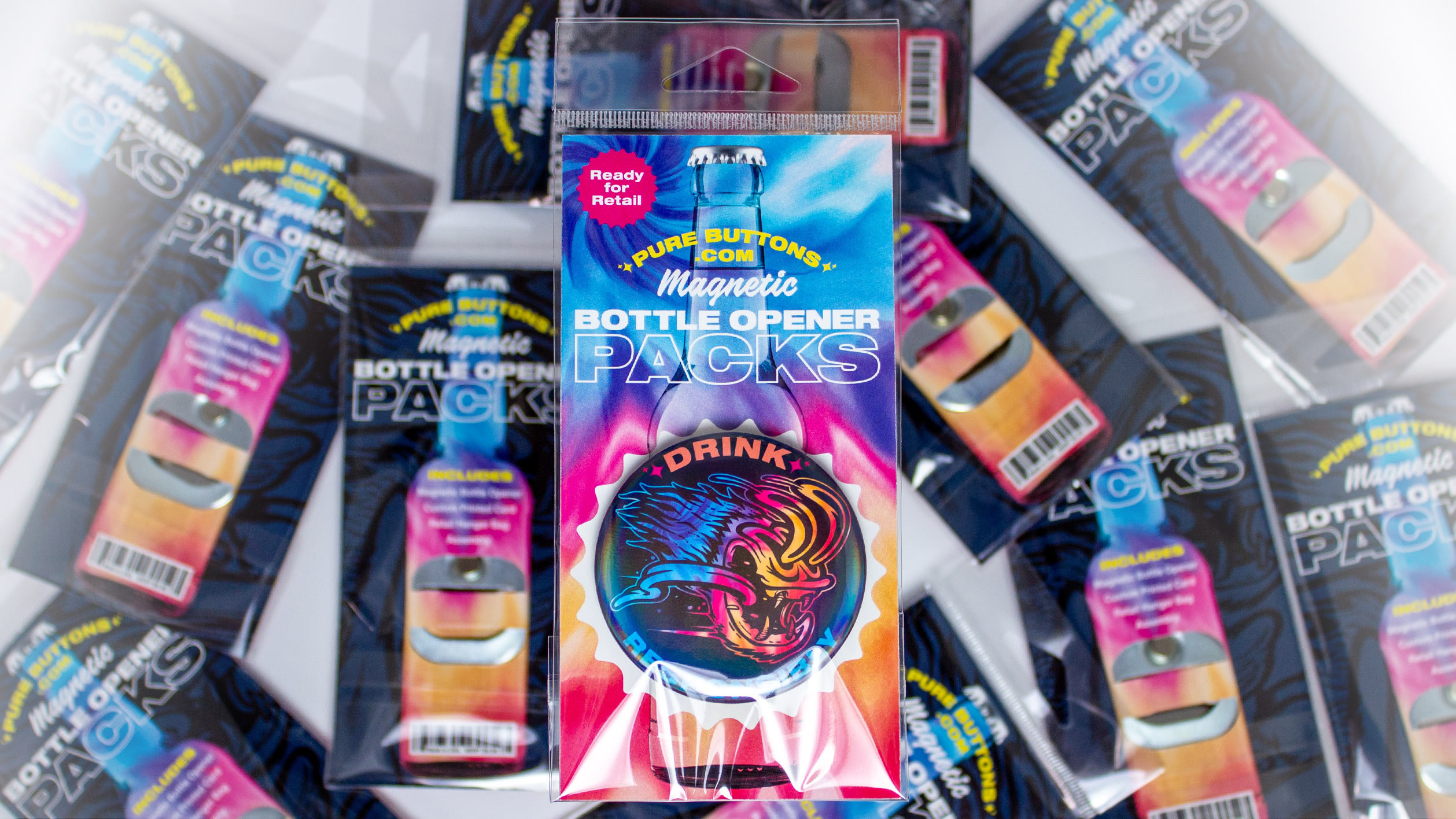 A pile of custom bottle openers in retail packaging.